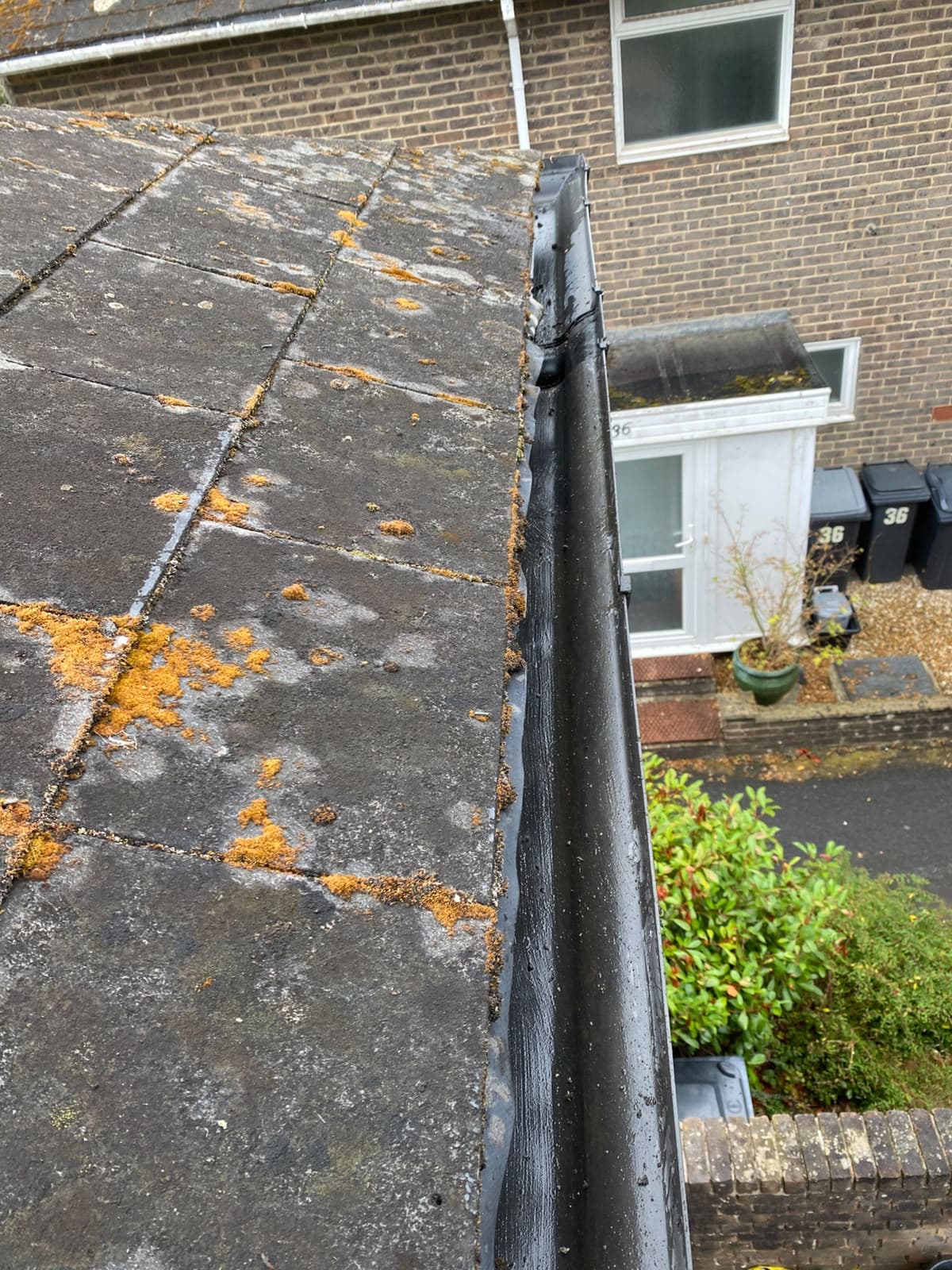 Weathered roof edge and guttering